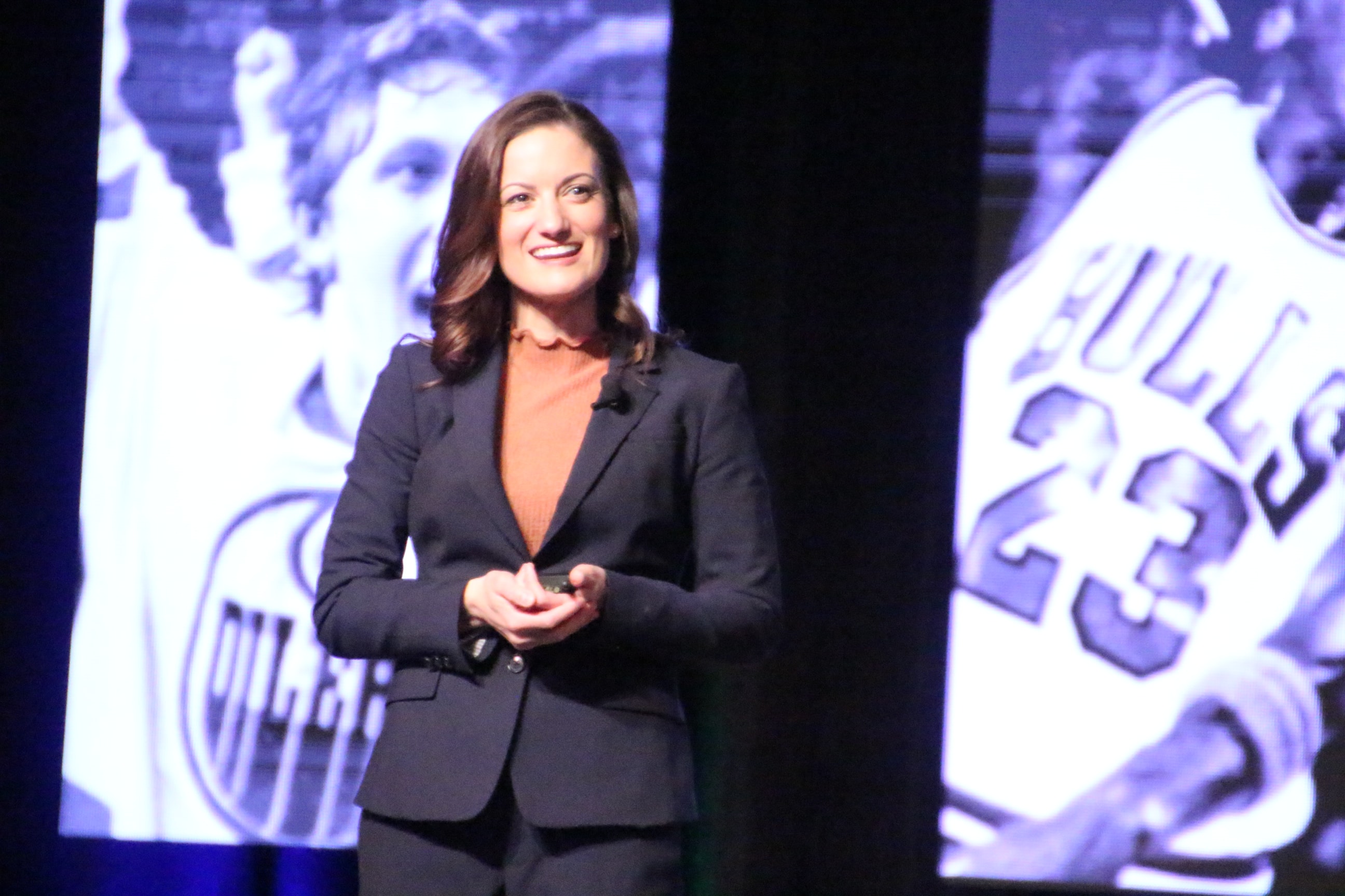 Dr. Tara Feil speaking at a professional event
